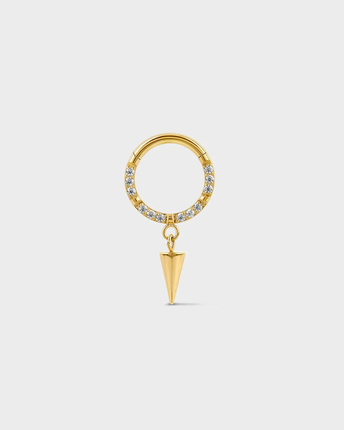 Semi pave gold titanium daith septum ring with dangle cone charm on a ligh gray background