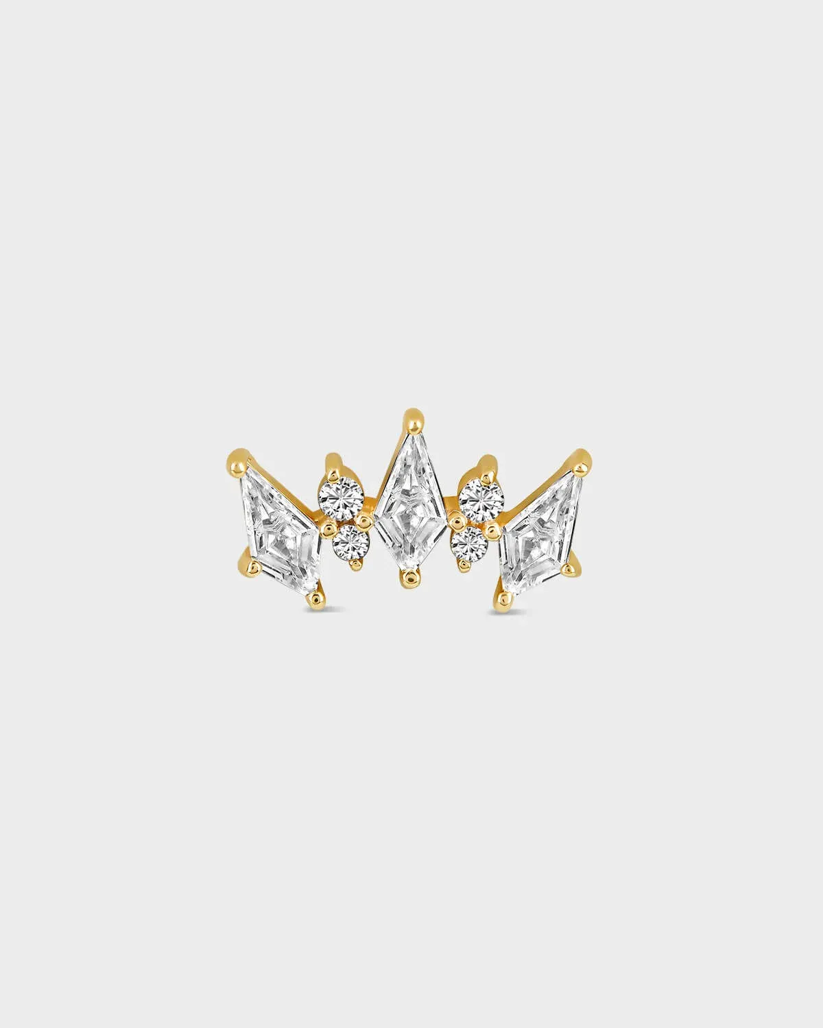 Gold and diamond earring on a white background