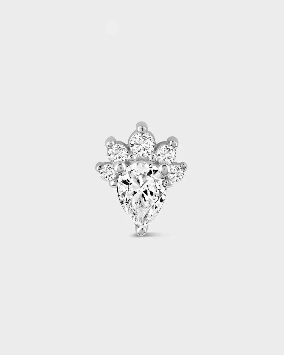 Diamond earring on a light gray background