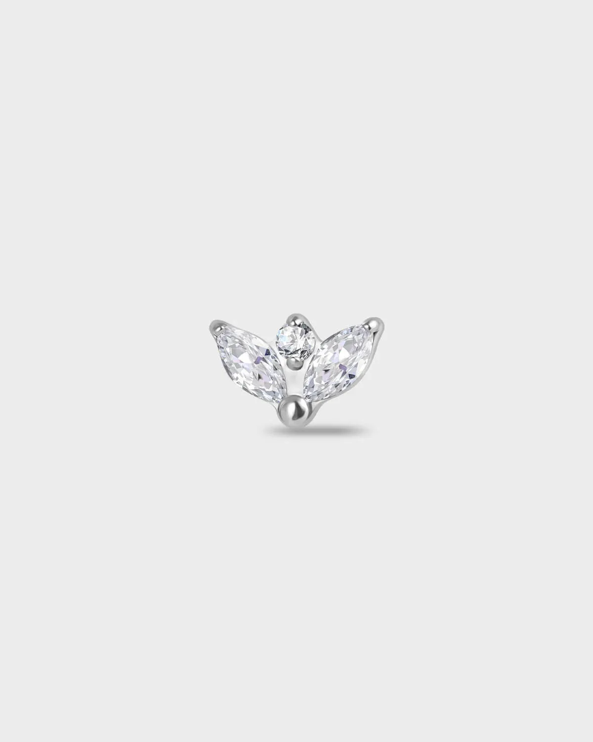 Polished silver Titanium earring with two marquise-cut clear stones set below a single round-cut clear stone on a light gray background.