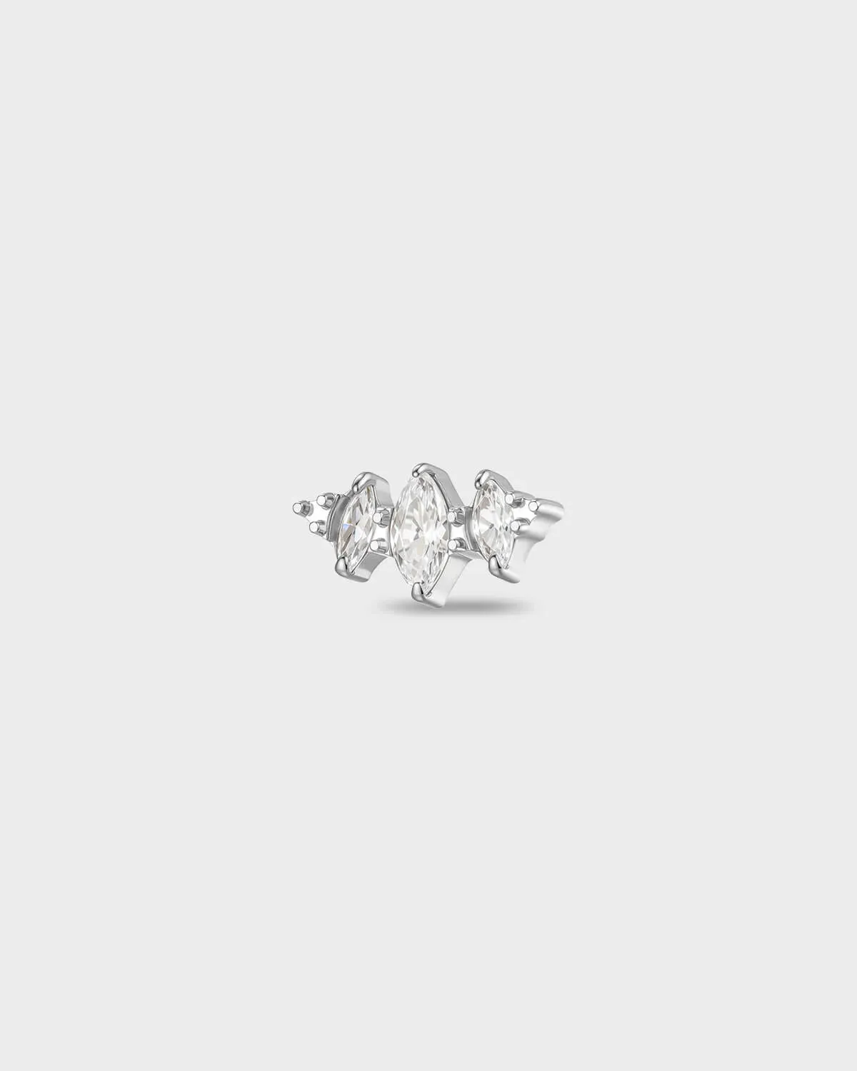 Polished titanium earring with three marquise-cut clear stones set in a stepped horizontal arrangement, on a light gray background.