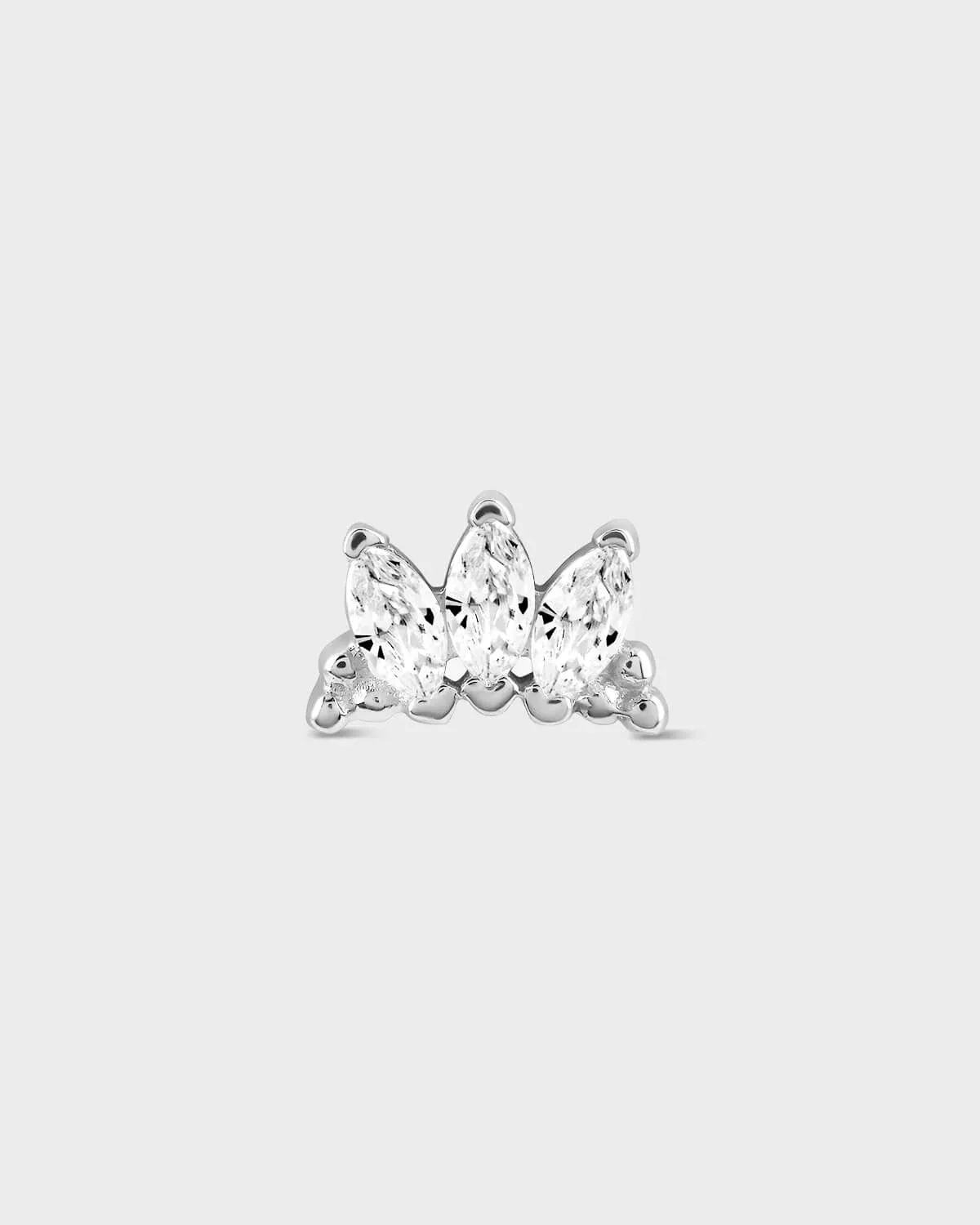 Butterfly-shaped diamond earring on a light gray background