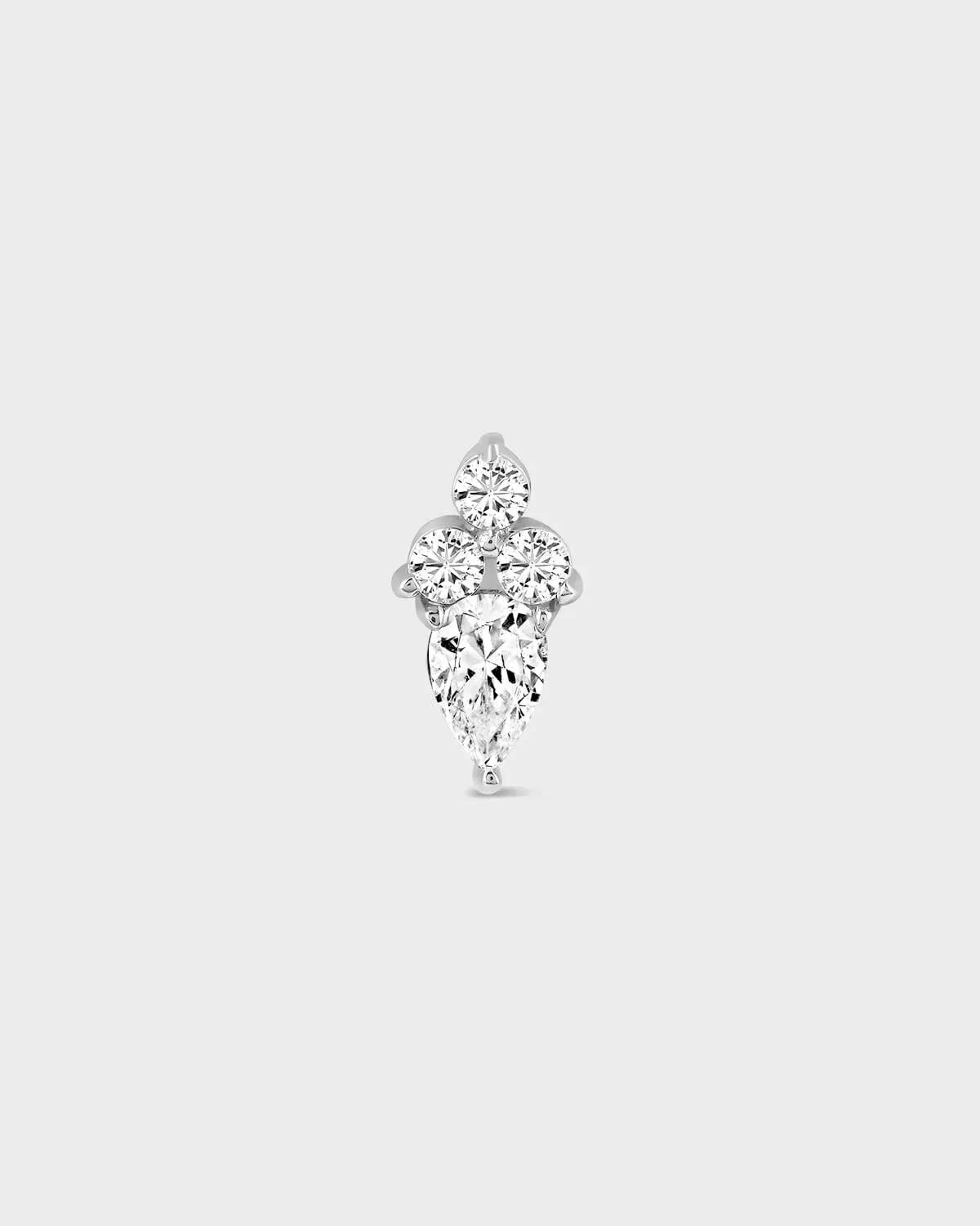 Diamond earring on a light gray background