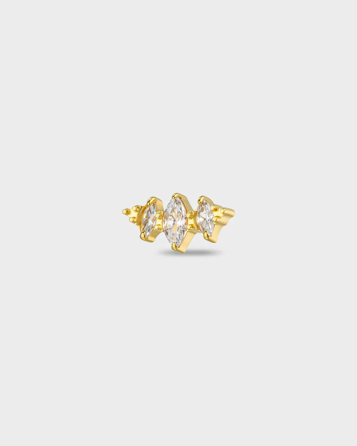 Gold titanium earring with three marquise-cut clear stones set in a stepped horizontal arrangement, on a light gray background.