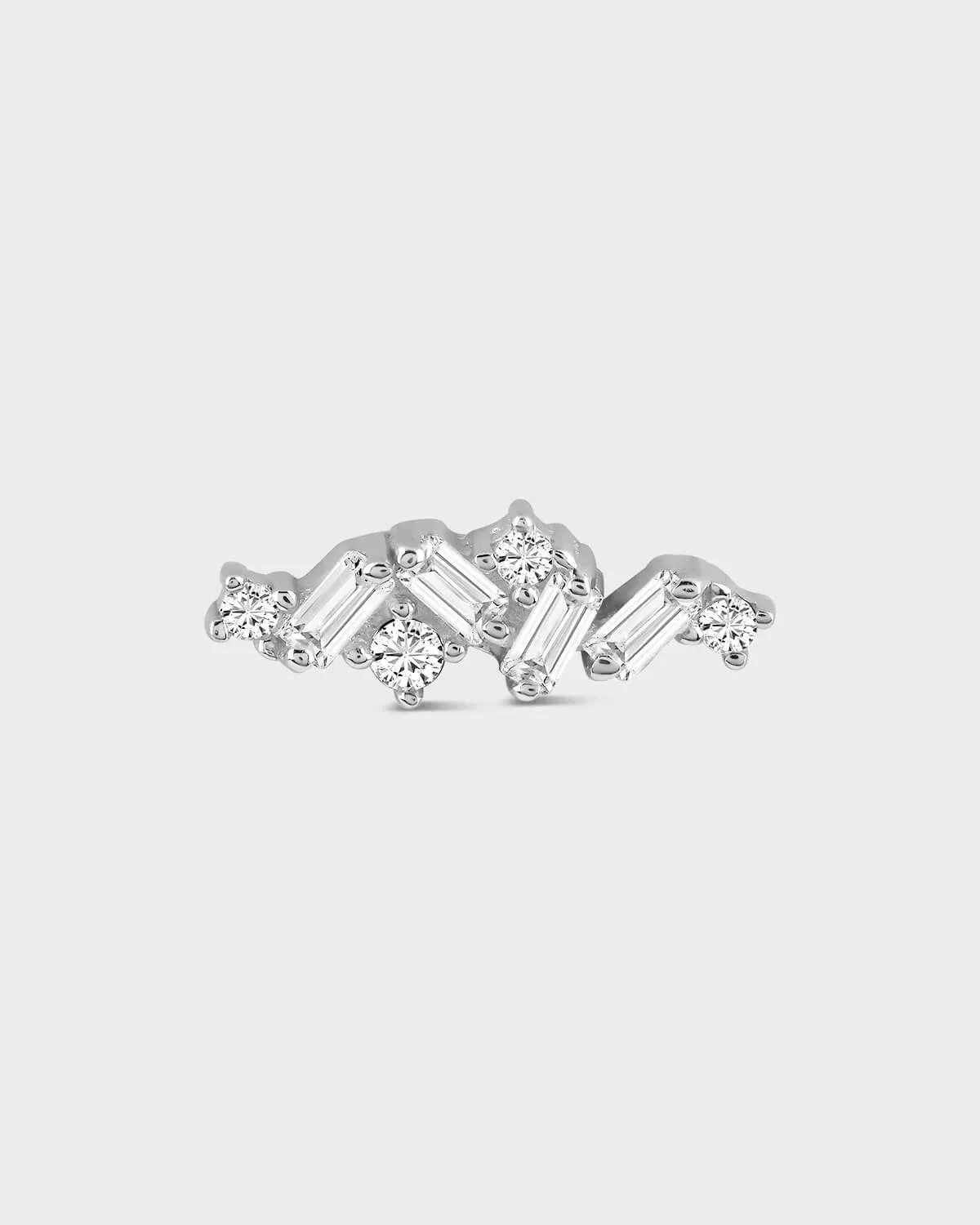 Diamond earring on a light gray background
