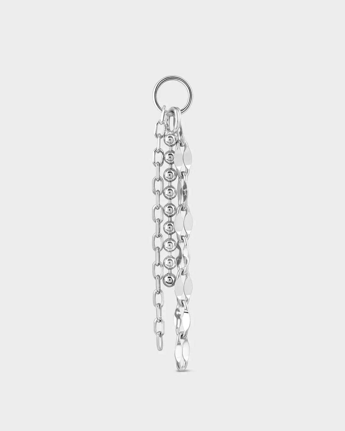 Silver chain earring on a light gray background